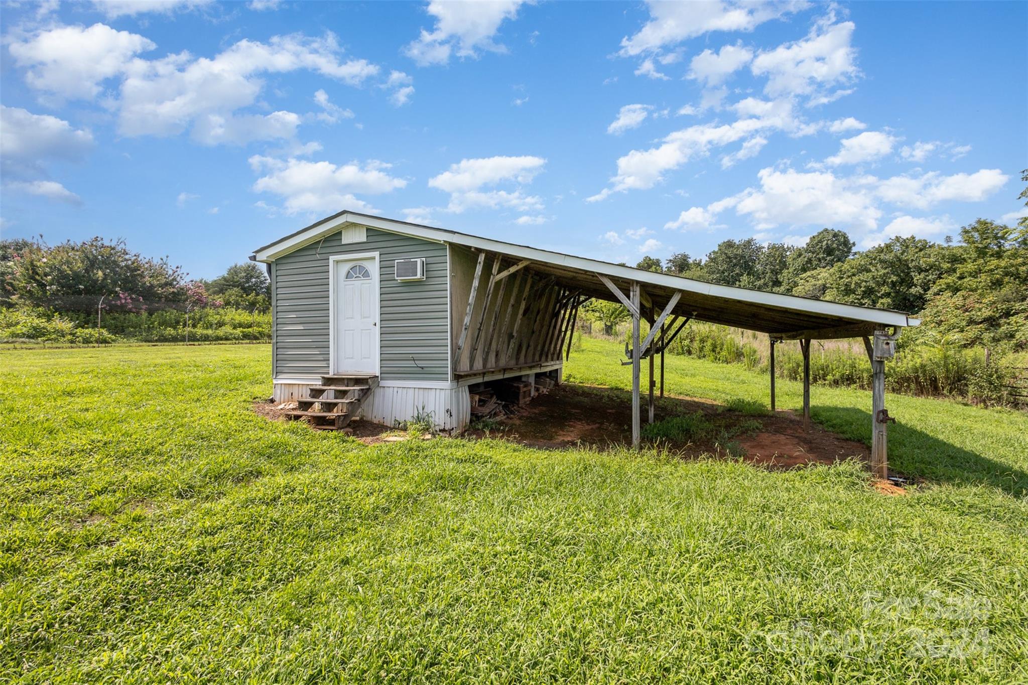 5306 Macedonia Church Road Vale, NC 28168 - Photo 25 of 35 a house view with a garden space