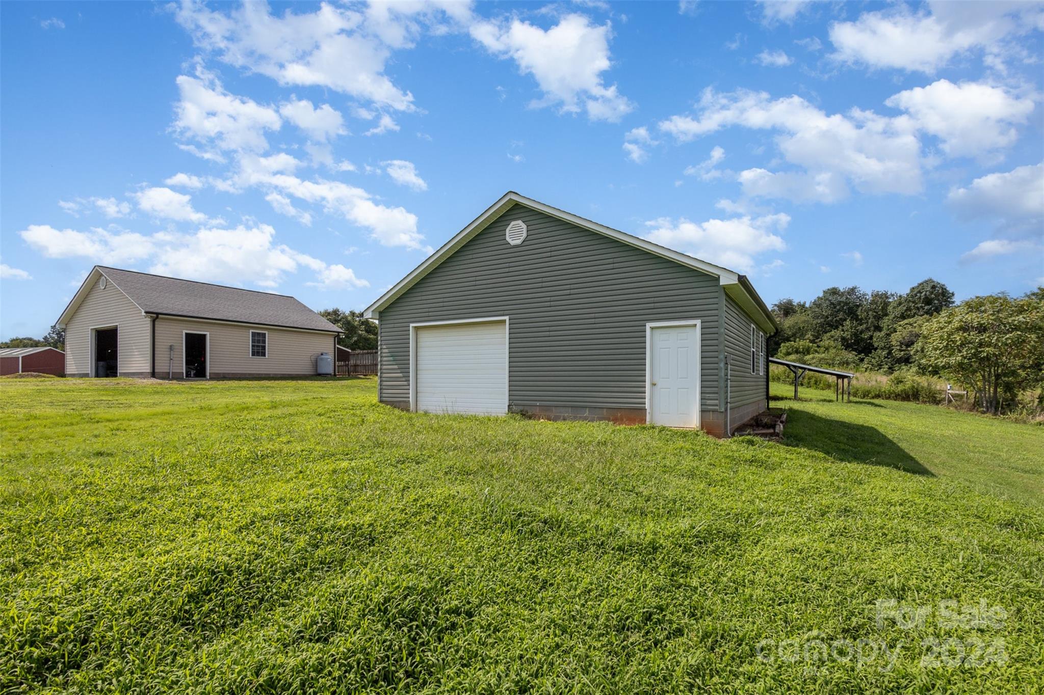 5306 Macedonia Church Road Vale, NC 28168 - Photo 26 of 35 a front view of house with yard and green space