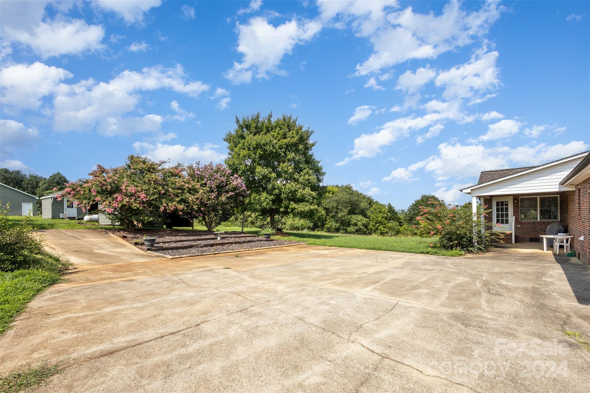 5306 Macedonia Church Road Vale, NC 28168 - Photo 27 of 35 a view of a terrace with a garden