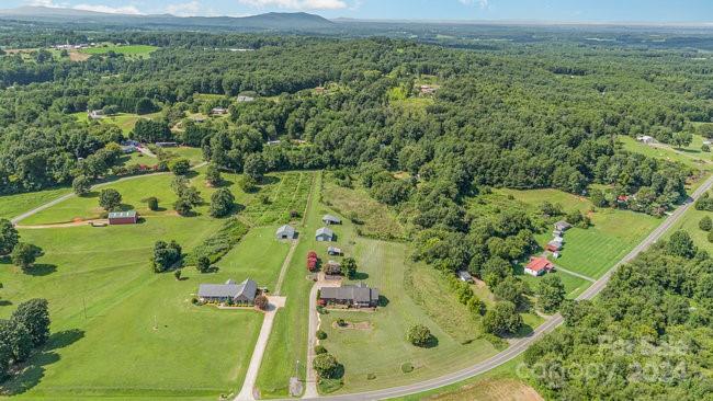 5306 Macedonia Church Road Vale, NC 28168 - Photo 34 of 35 an aerial view of a residential houses with outdoor space and trees