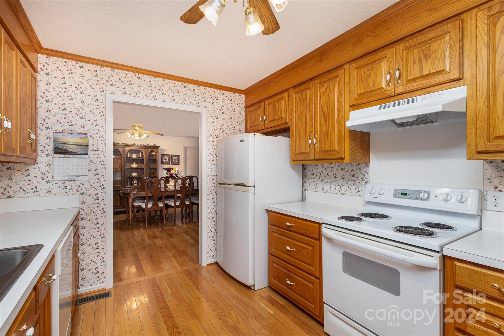 5306 Macedonia Church Road Vale, NC 28168 - Photo 10 of 35 a kitchen with stainless steel appliances granite countertop a stove and a refrigerator