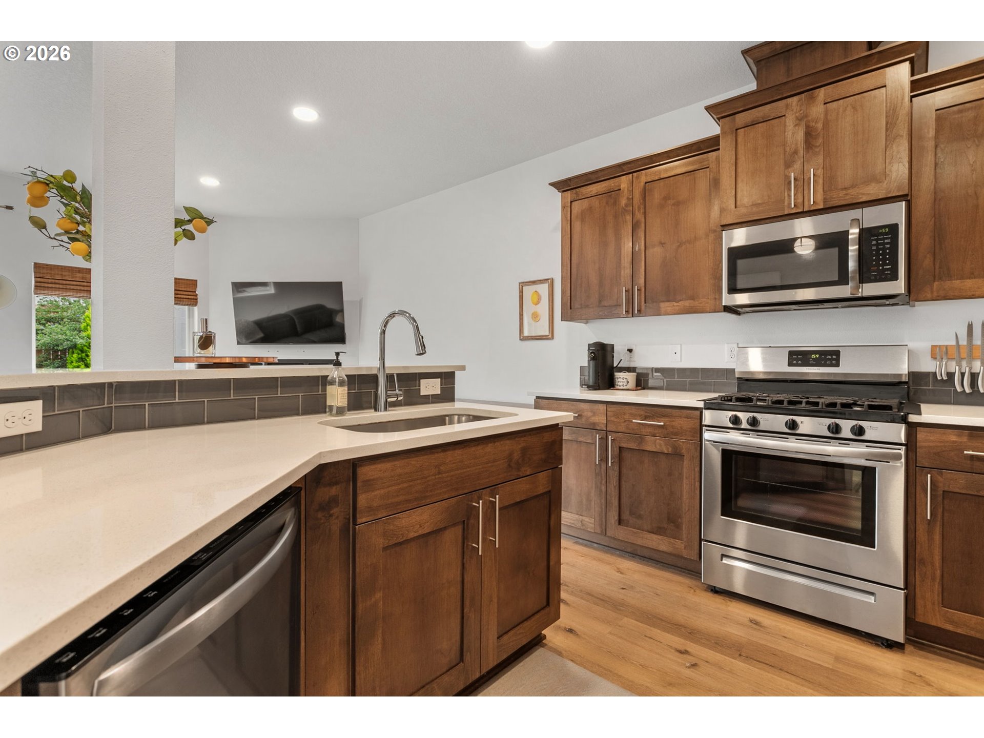 808 South 23rd Avenue Cornelius, OR 97113 - Photo 11 of 36 a kitchen with stainless steel appliances a stove microwave and sink
