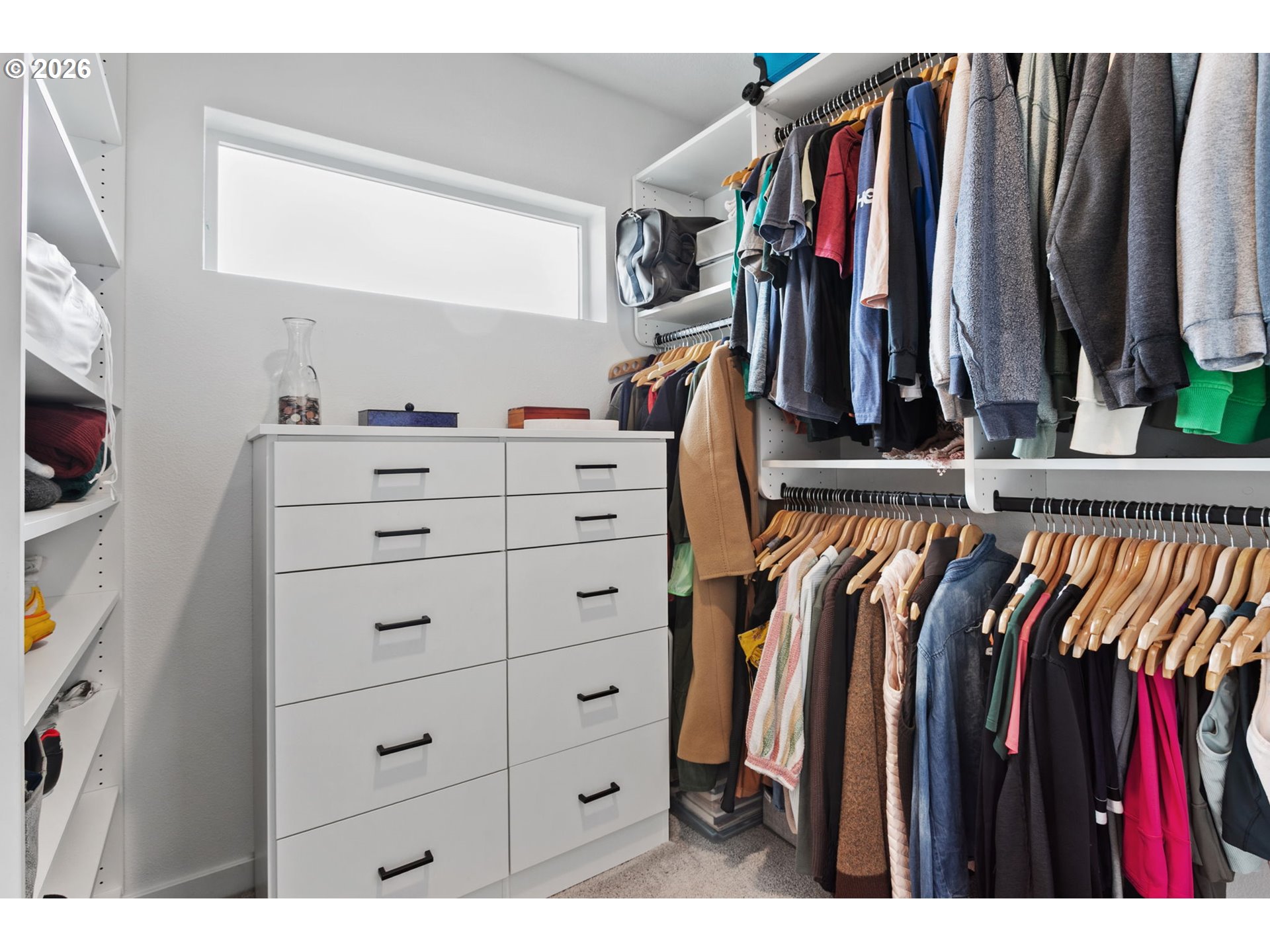 808 South 23rd Avenue Cornelius, OR 97113 - Photo 17 of 36 a view of walk in closet with clothes and shoes