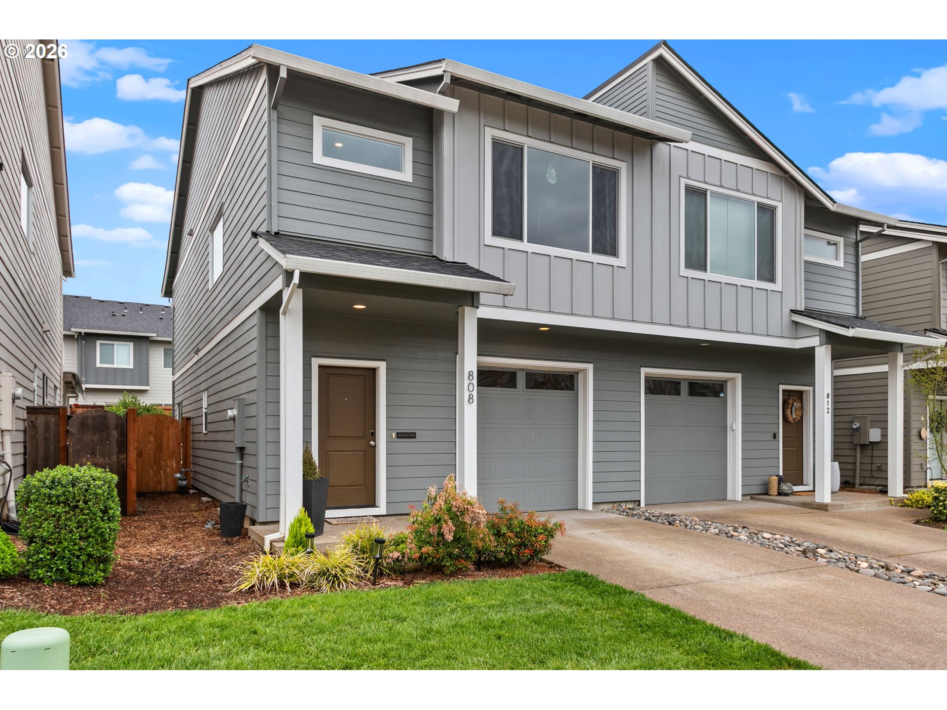 808 South 23rd Avenue Cornelius, OR 97113 - Photo 2 of 36 a front view of a house with garden
