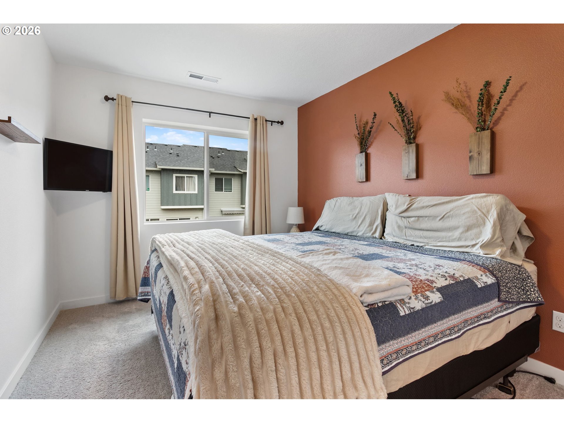 808 South 23rd Avenue Cornelius, OR 97113 - Photo 21 of 36 a bedroom with a bed and a painting on the wall