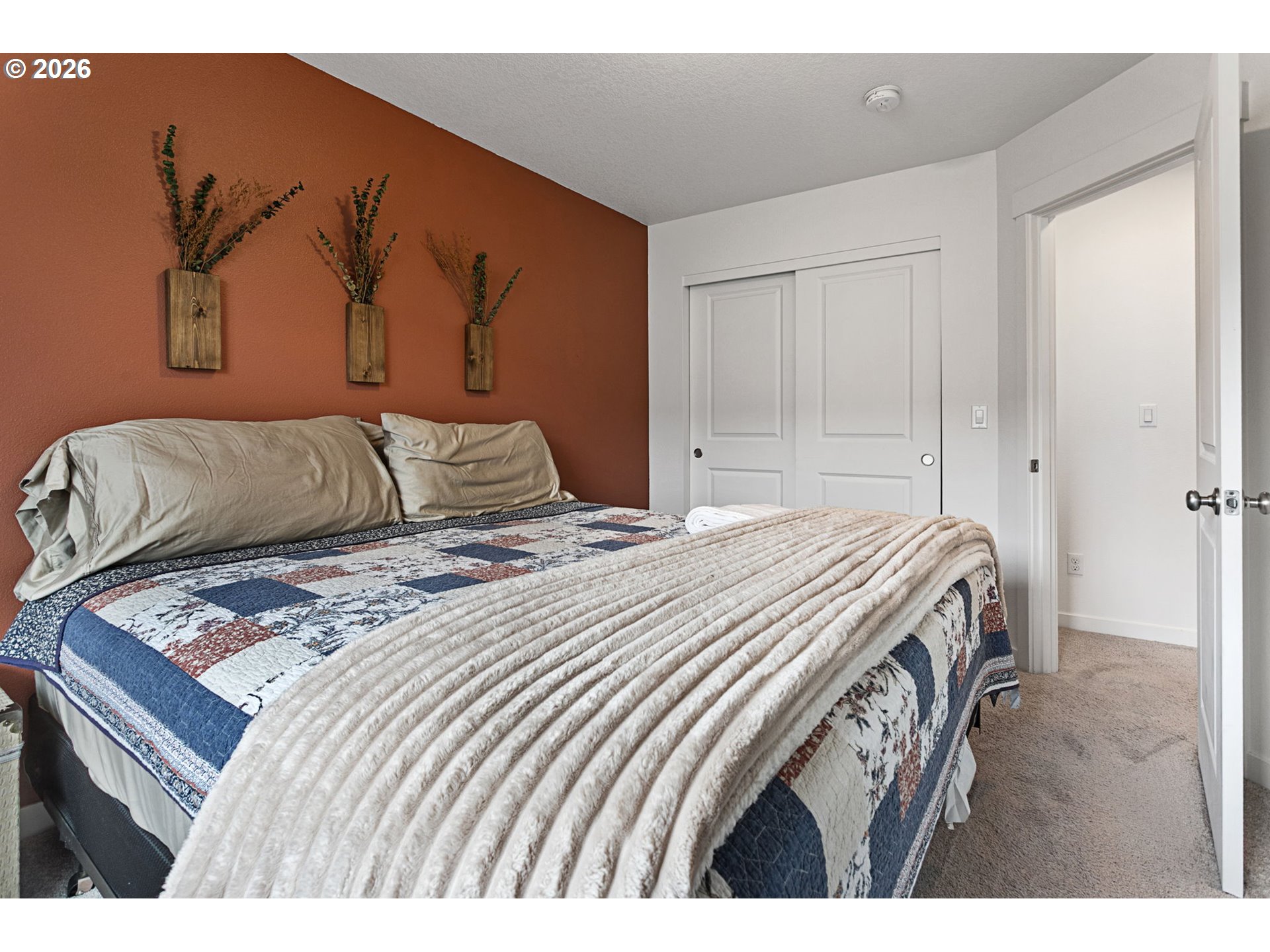 808 South 23rd Avenue Cornelius, OR 97113 - Photo 22 of 36 a bedroom with a bed and a painting on the wall