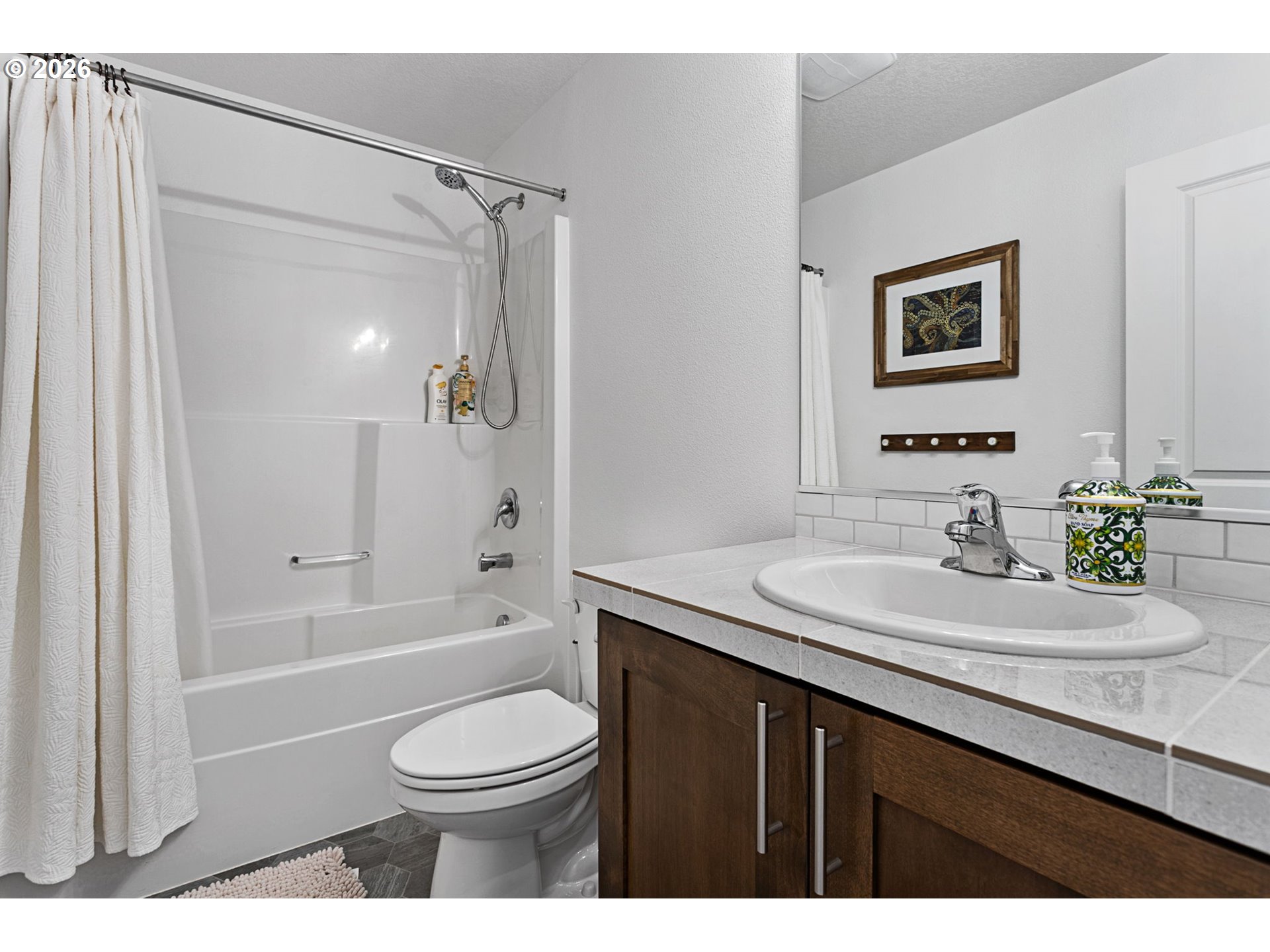 808 South 23rd Avenue Cornelius, OR 97113 - Photo 24 of 36 a bathroom with a sink a toilet and shower