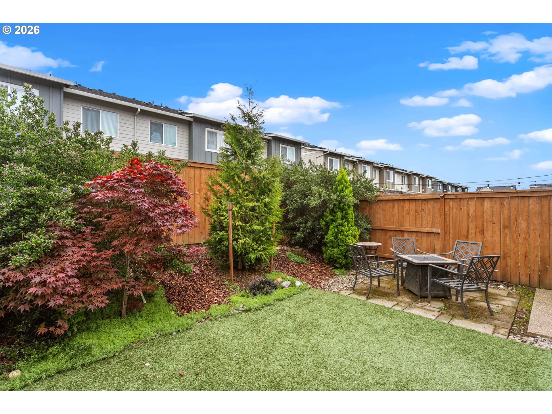 808 South 23rd Avenue Cornelius, OR 97113 - Photo 29 of 36 a backyard of a house with table and chairs