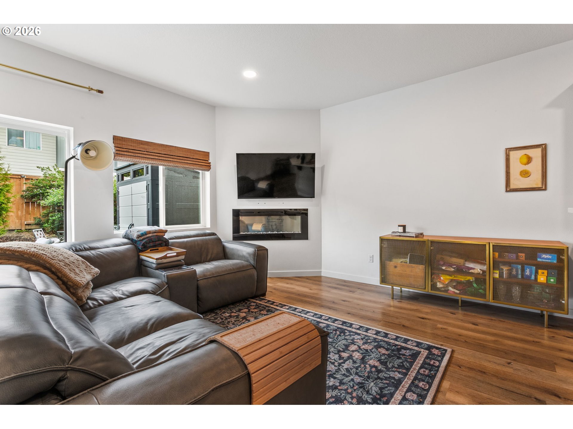 808 South 23rd Avenue Cornelius, OR 97113 - Photo 6 of 36 a living room with furniture and a flat screen tv