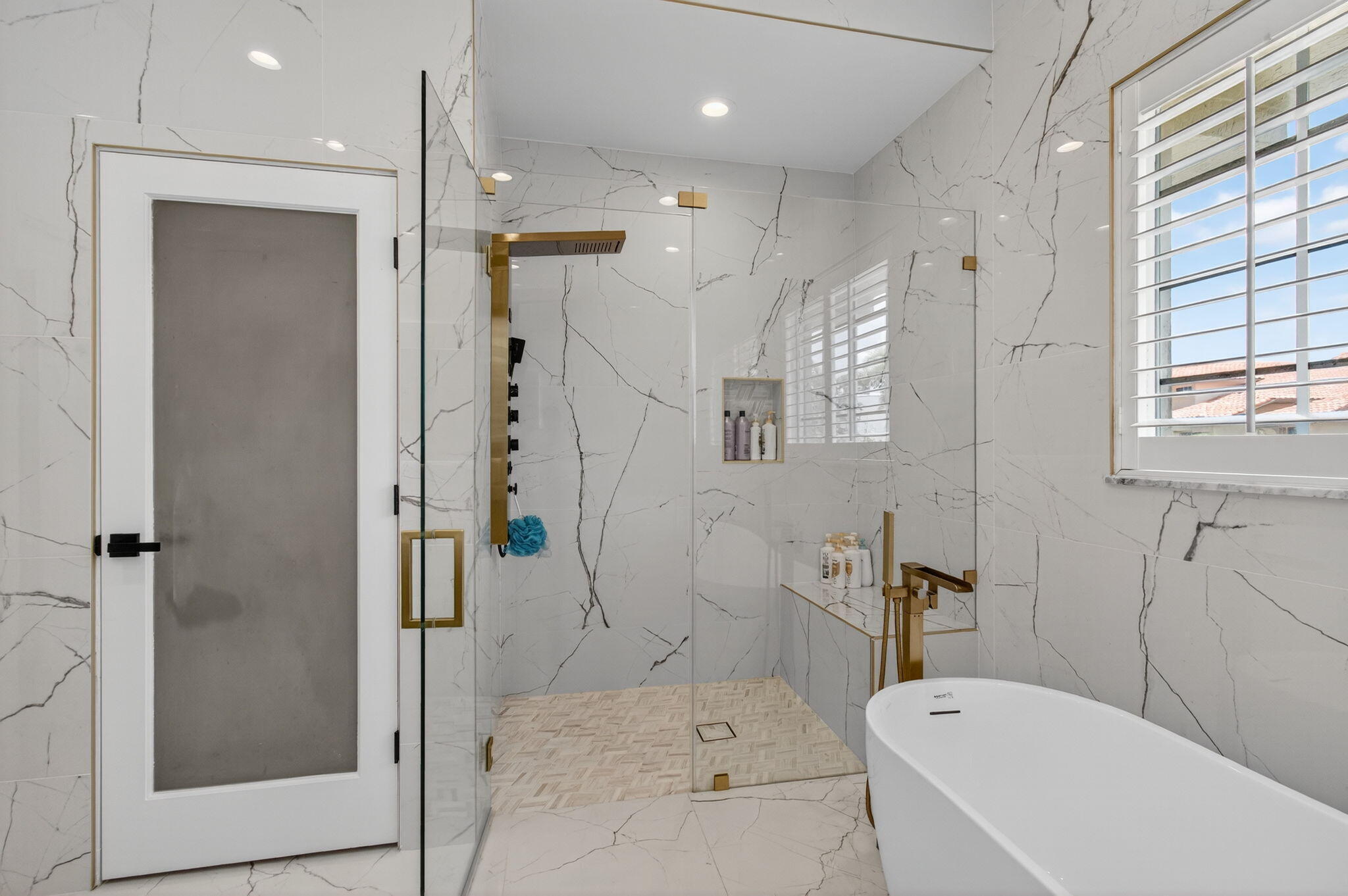 2621 Northwest 53rd Drive Boca Raton, FL 33496 - Photo 22 of 52 a bathroom with a sink a toilet and shower