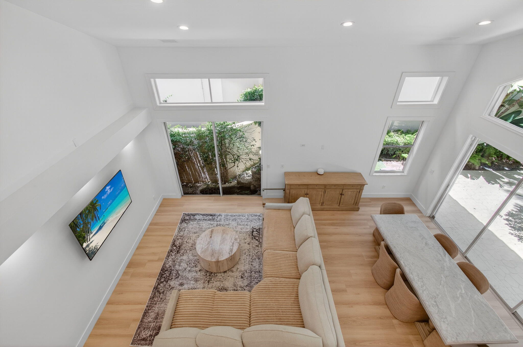 2621 Northwest 53rd Drive Boca Raton, FL 33496 - Photo 24 of 52 a living room with furniture and a large window
