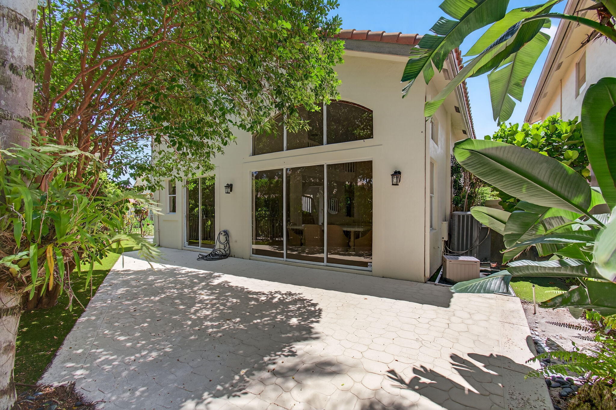 2621 Northwest 53rd Drive Boca Raton, FL 33496 - Photo 39 of 52 a view of a house with a yard