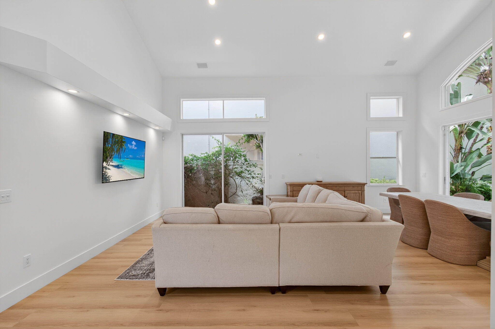 2621 Northwest 53rd Drive Boca Raton, FL 33496 - Photo 6 of 52 a living room with furniture and a large window