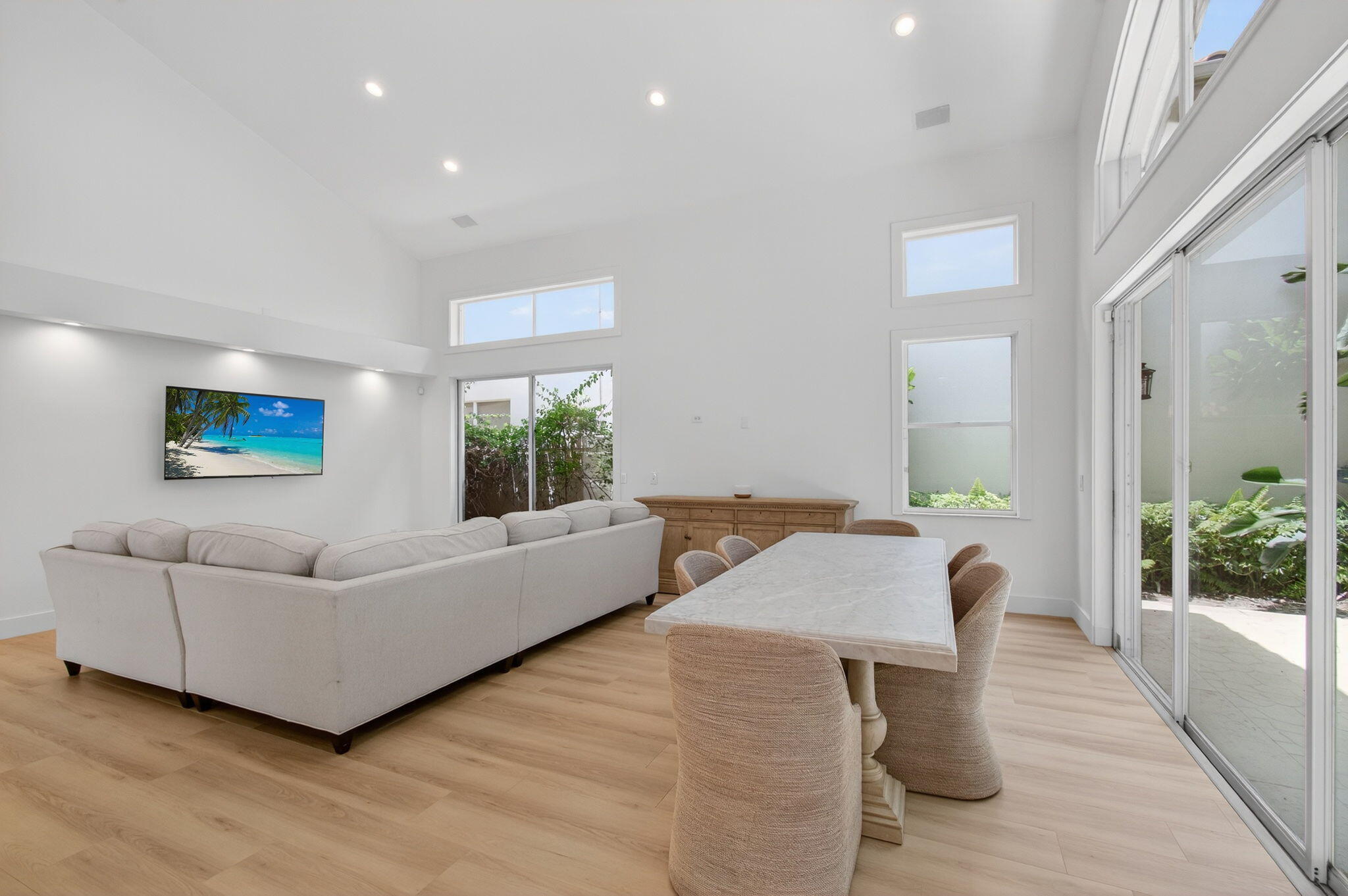 2621 Northwest 53rd Drive Boca Raton, FL 33496 - Photo 8 of 52 a living room with furniture and a large window