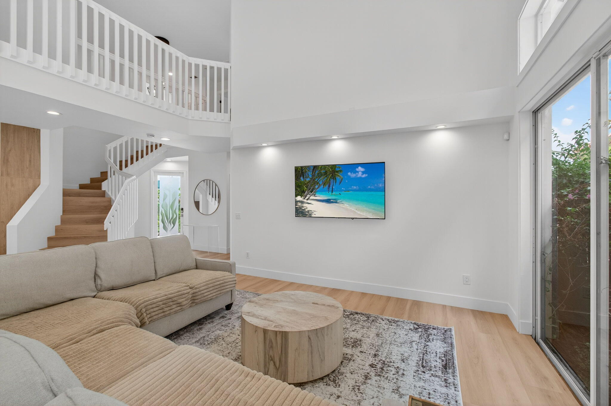 2621 Northwest 53rd Drive Boca Raton, FL 33496 - Photo 9 of 52 a living room with furniture and a rug