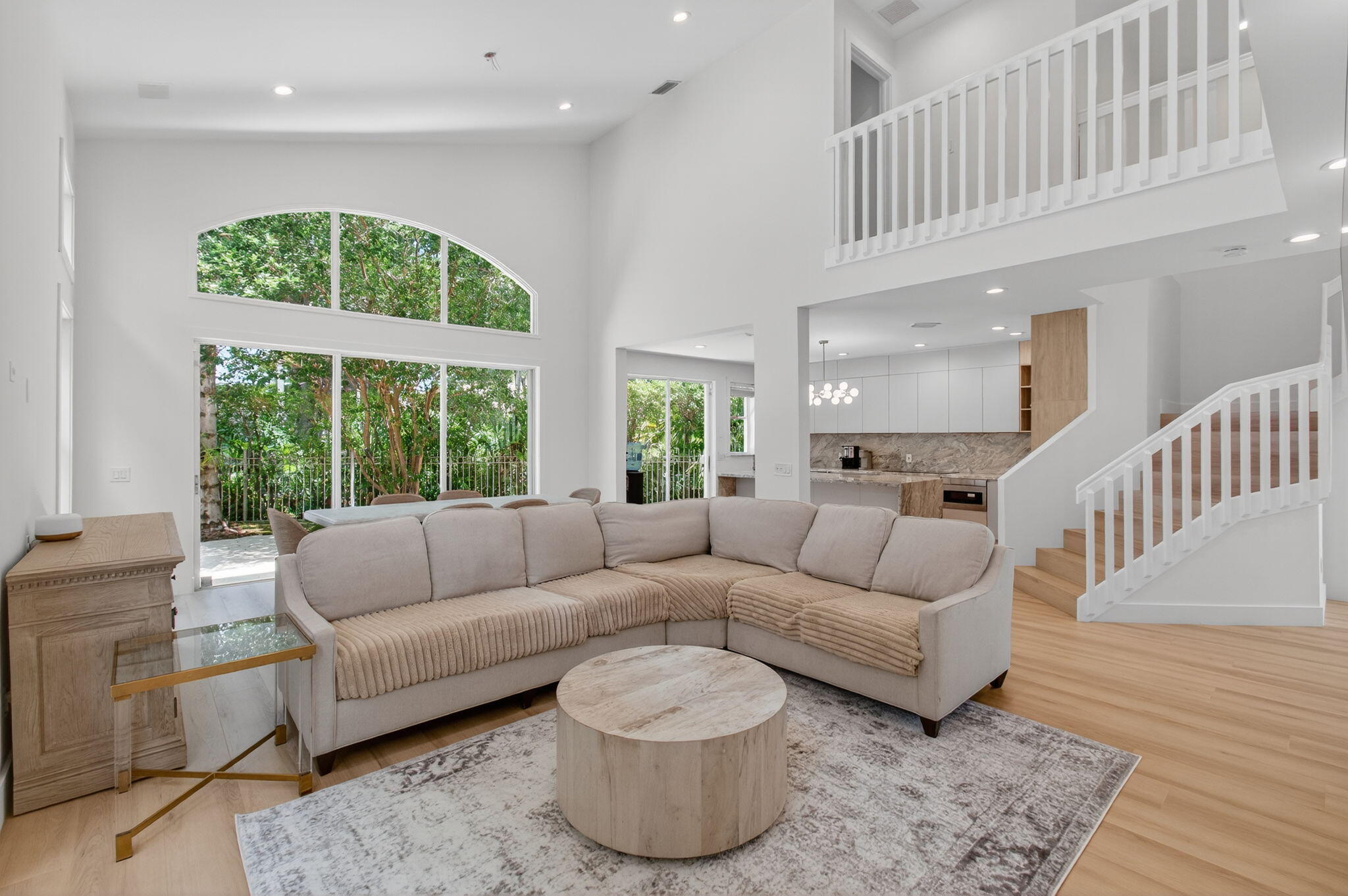 2621 Northwest 53rd Drive Boca Raton, FL 33496 - Photo 10 of 52 a living room with furniture and a large window