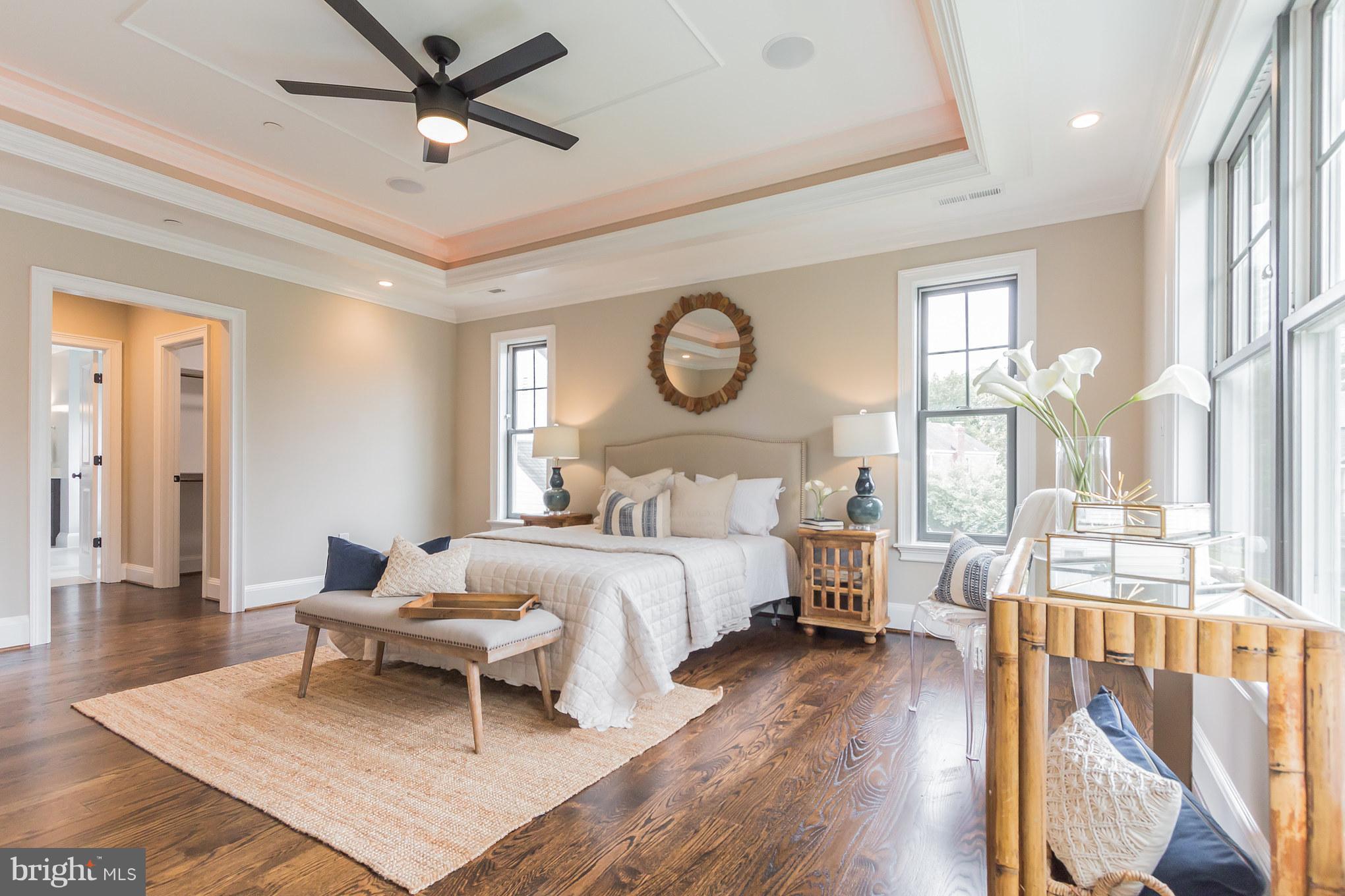 736 Thayer Avenue Silver Spring, MD 20910 - Photo 21 of 30 a bedroom with bed and a large window