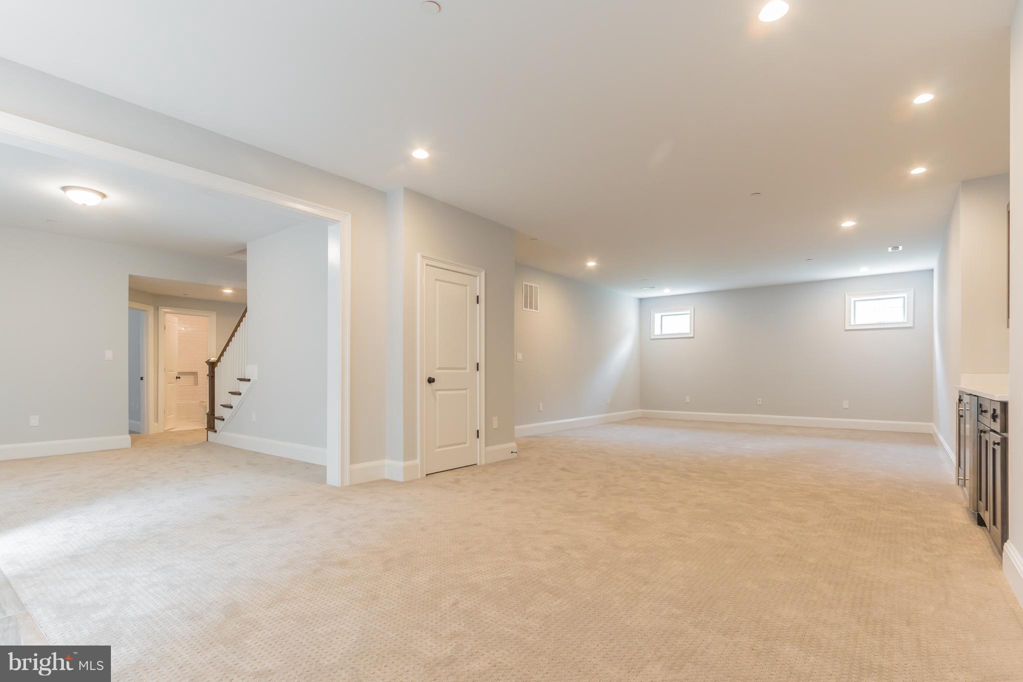 736 Thayer Avenue Silver Spring, MD 20910 - Photo 29 of 30 an empty room with windows and refrigerator