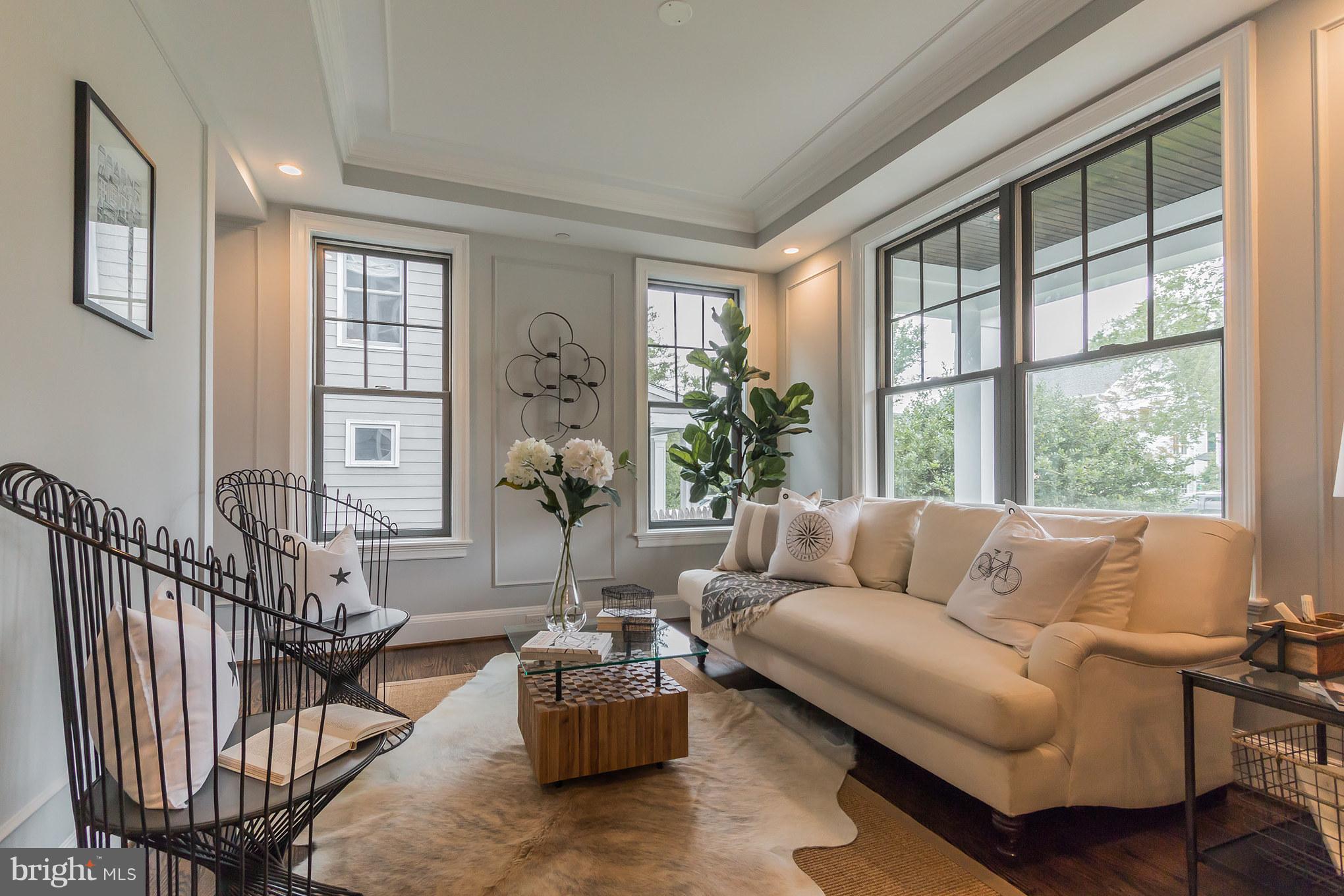736 Thayer Avenue Silver Spring, MD 20910 - Photo 5 of 30 a living room with furniture and a large window