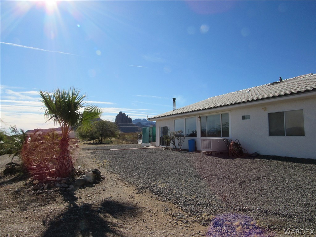 2002 Drake Road Golden Valley, AZ 86413 - Photo 5 of 50 a front view of house with a yard