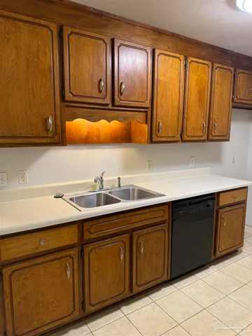 a kitchen with a sink and a cabinets