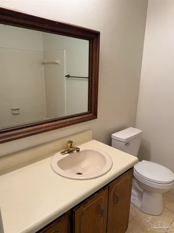 a bathroom with a sink and a toilet