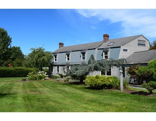 27 Sampson Road Bolton, MA 01740 - Photo 1 of 42 a front view of a house with a yard