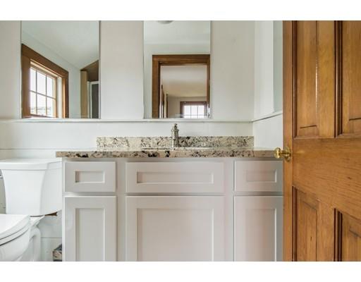 27 Sampson Road Bolton, MA 01740 - Photo 25 of 42 a bathroom with a sink and a mirror