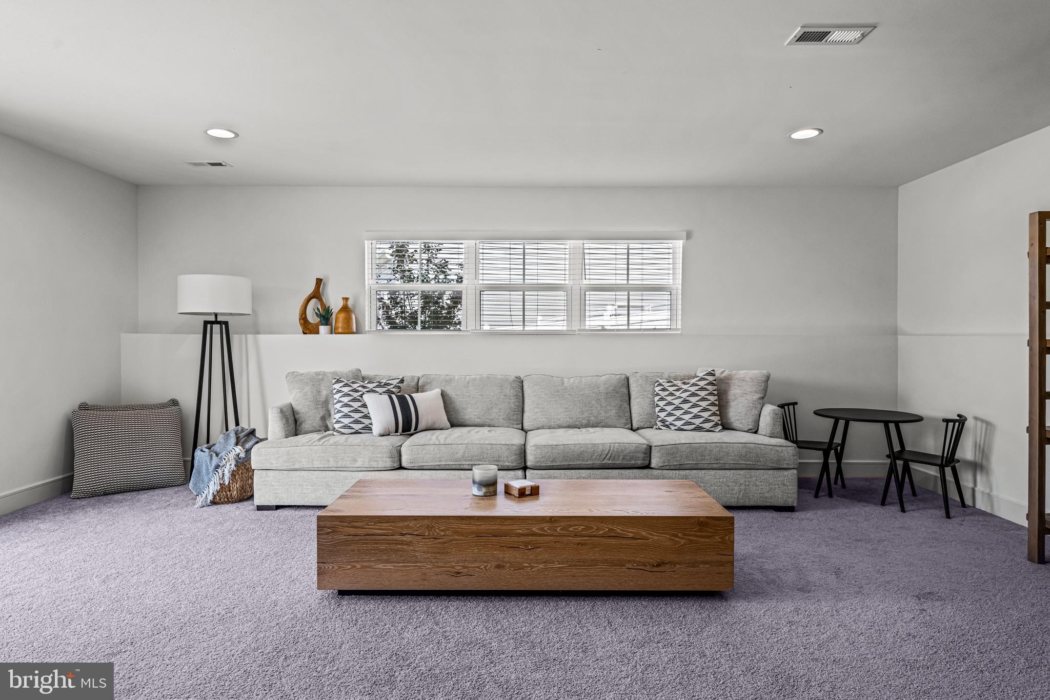 641 A Fordville Road Bridgeton, NJ 08302 - Photo 20 of 34 a living room with furniture and a large window