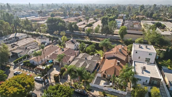 an aerial view of a city with lots of residential buildings