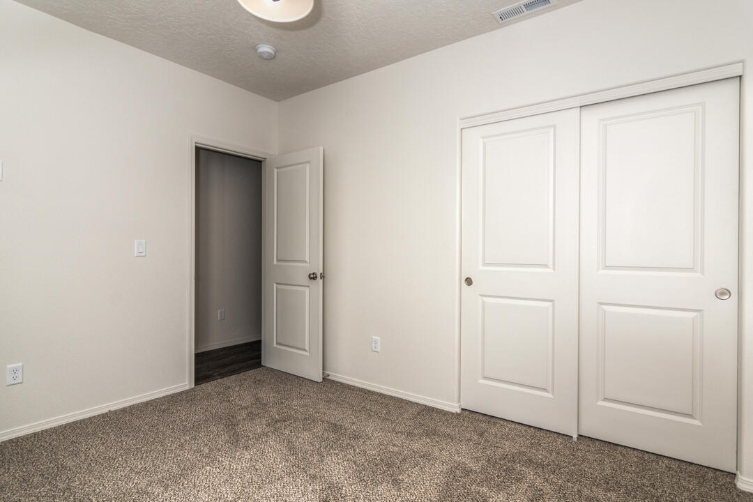 17084 Indio Road Bend, OR 97707 - Photo 23 of 40 an empty room with closet area