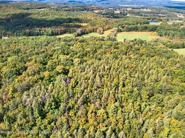a view of a house with a mountain