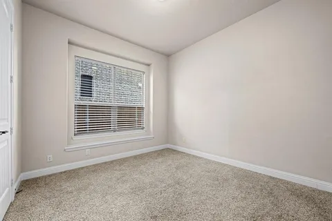 a bathroom with a tub and shower