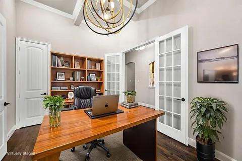 a view of a workspace with furniture