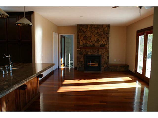 3536 Dove Hollow Road Encinitas, CA 92024 - Photo 6 of 25 Hearthroom - kitchen to left, laundry room beyond fireplace, breakfast area where standing