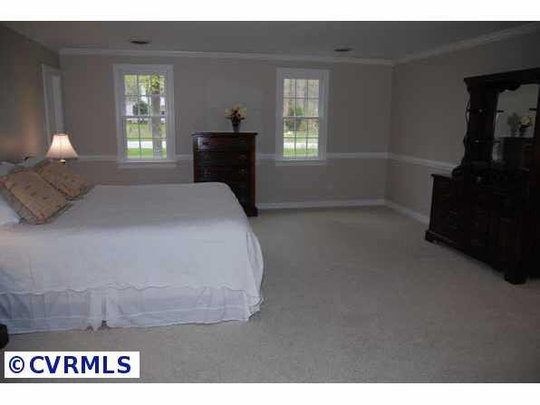 Other - Master bedroom featuring brand new carpet and a walk-in custom-built closet