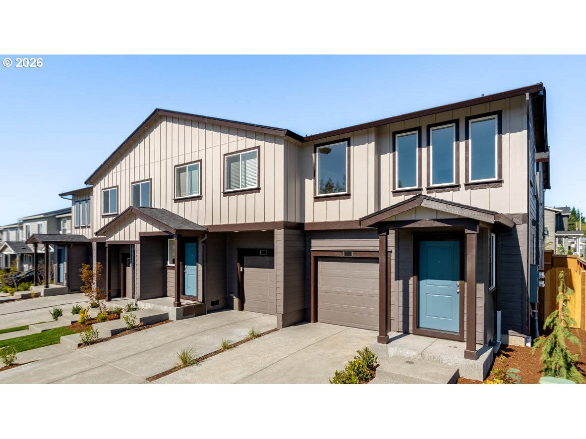 6112 Southeast 16th Street Gresham, OR 97080 - Photo 1 of 30 a front view of a house with yard