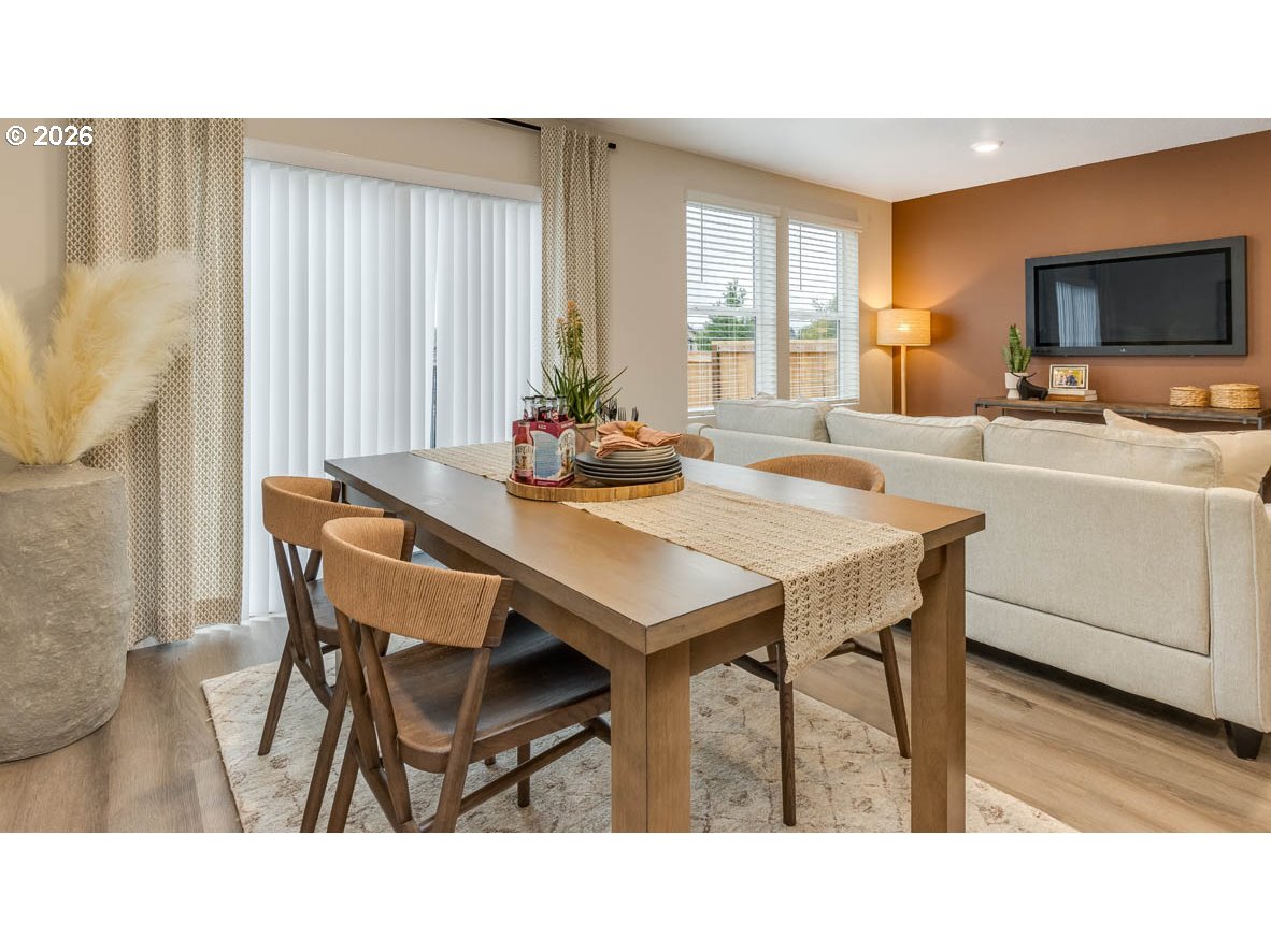 6112 Southeast 16th Street Gresham, OR 97080 - Photo 13 of 30 a kitchen with a table and chairs in it