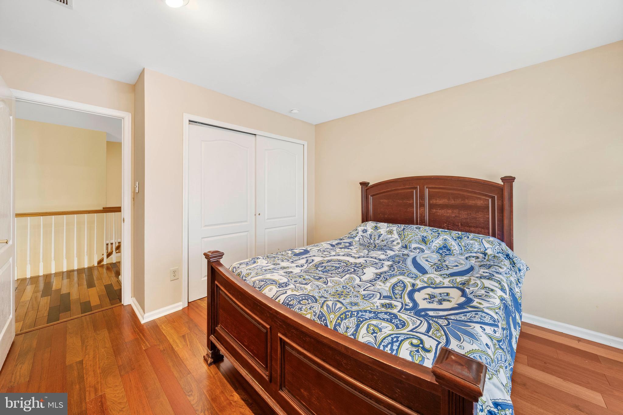 33 Cayuga Road Bordentown, NJ 08505 - Photo 15 of 30 a bedroom with a bed and wooden floor