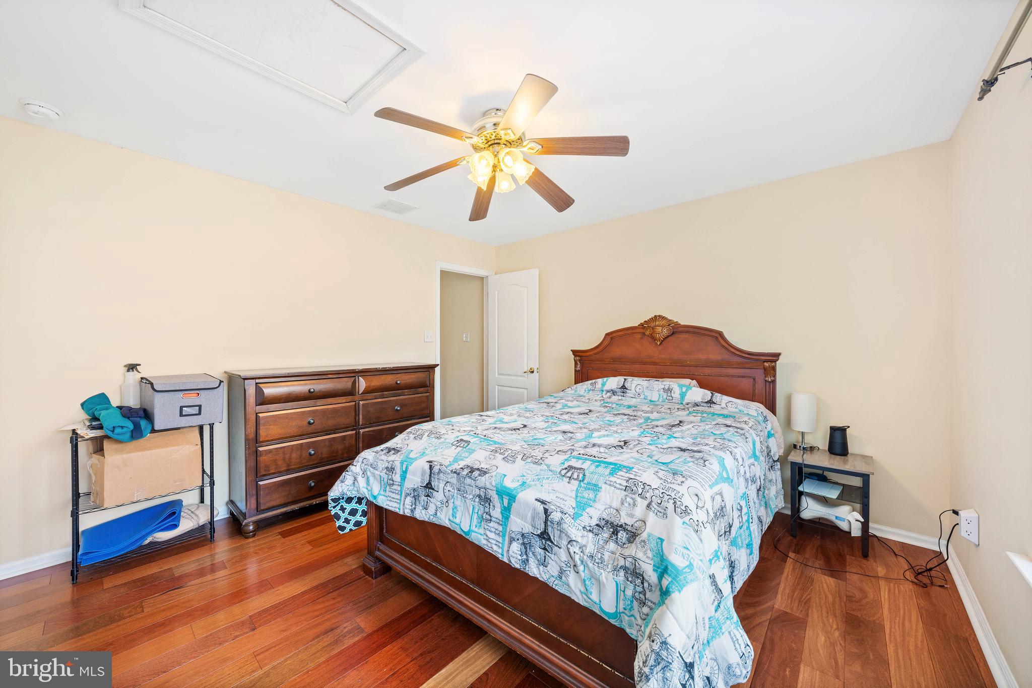 33 Cayuga Road Bordentown, NJ 08505 - Photo 18 of 30 a bedroom with a bed and a chandelier