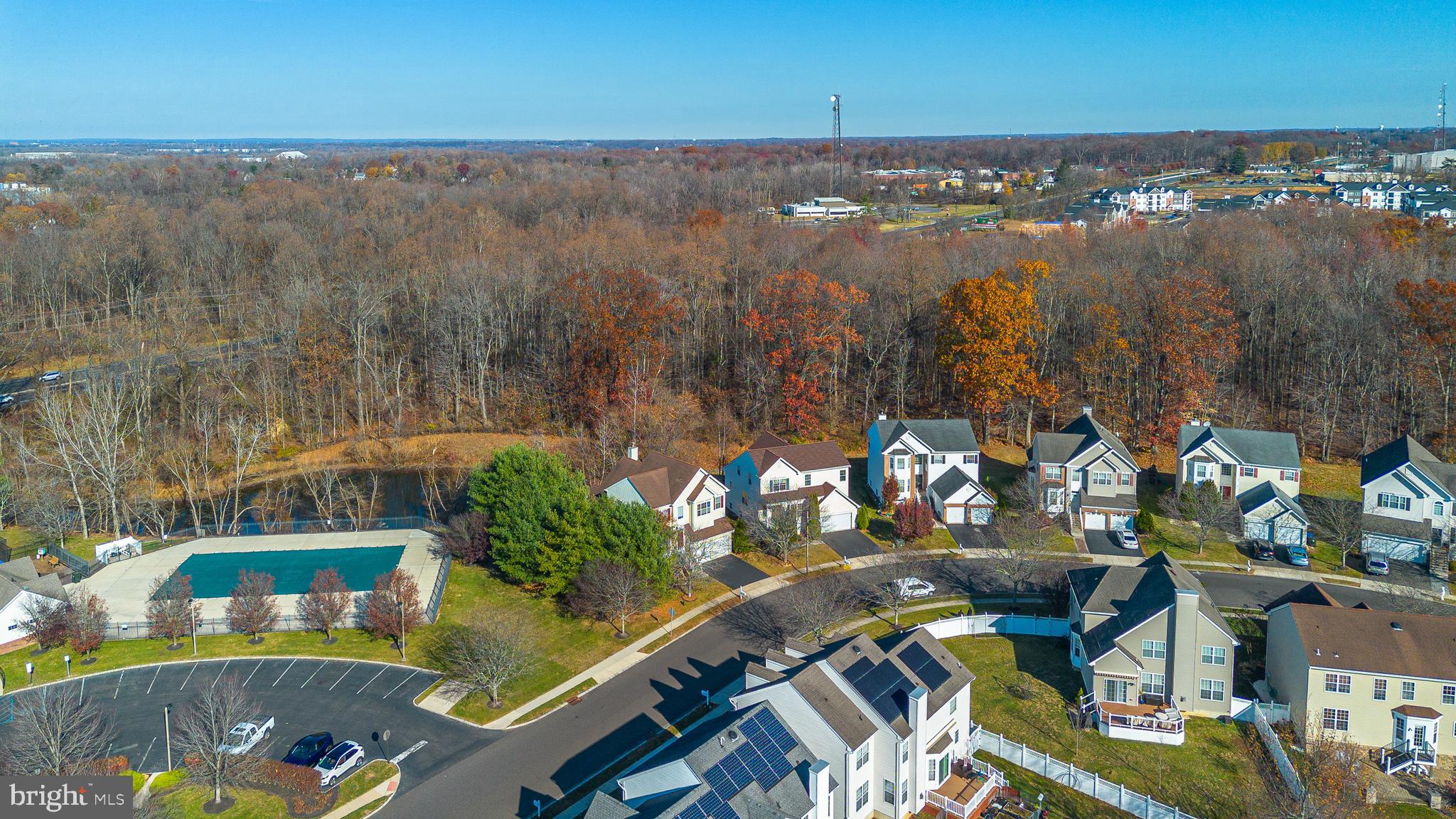 33 Cayuga Road Bordentown, NJ 08505 - Photo 28 of 30 a view of swimming pool with outdoor seating and city view