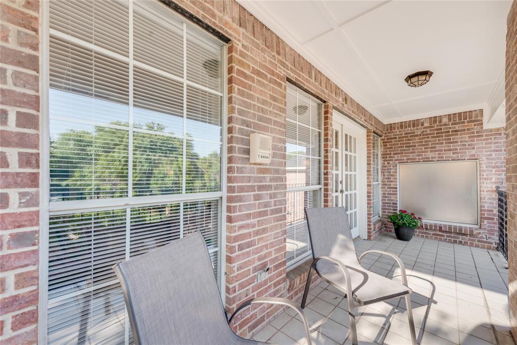 7204 Debbe Drive Dallas, TX 75252 - Photo 27 of 39 a view of a chair and table in back of the house