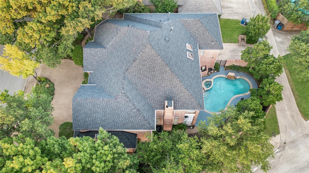 7204 Debbe Drive Dallas, TX 75252 - Photo 36 of 39 an aerial view of a house with outdoor space and street view