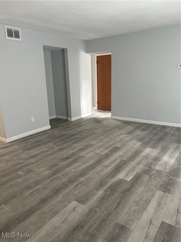 2525 Noble Road, Unit C3 Cleveland Heights, OH 44121 - Photo 6 of 11 Empty room featuring dark wood-type flooring
