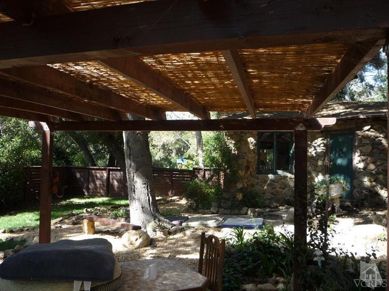 588 Cold Canyon Road Calabasas, CA 91302 - Photo 2 of 7 a view of yard with patio