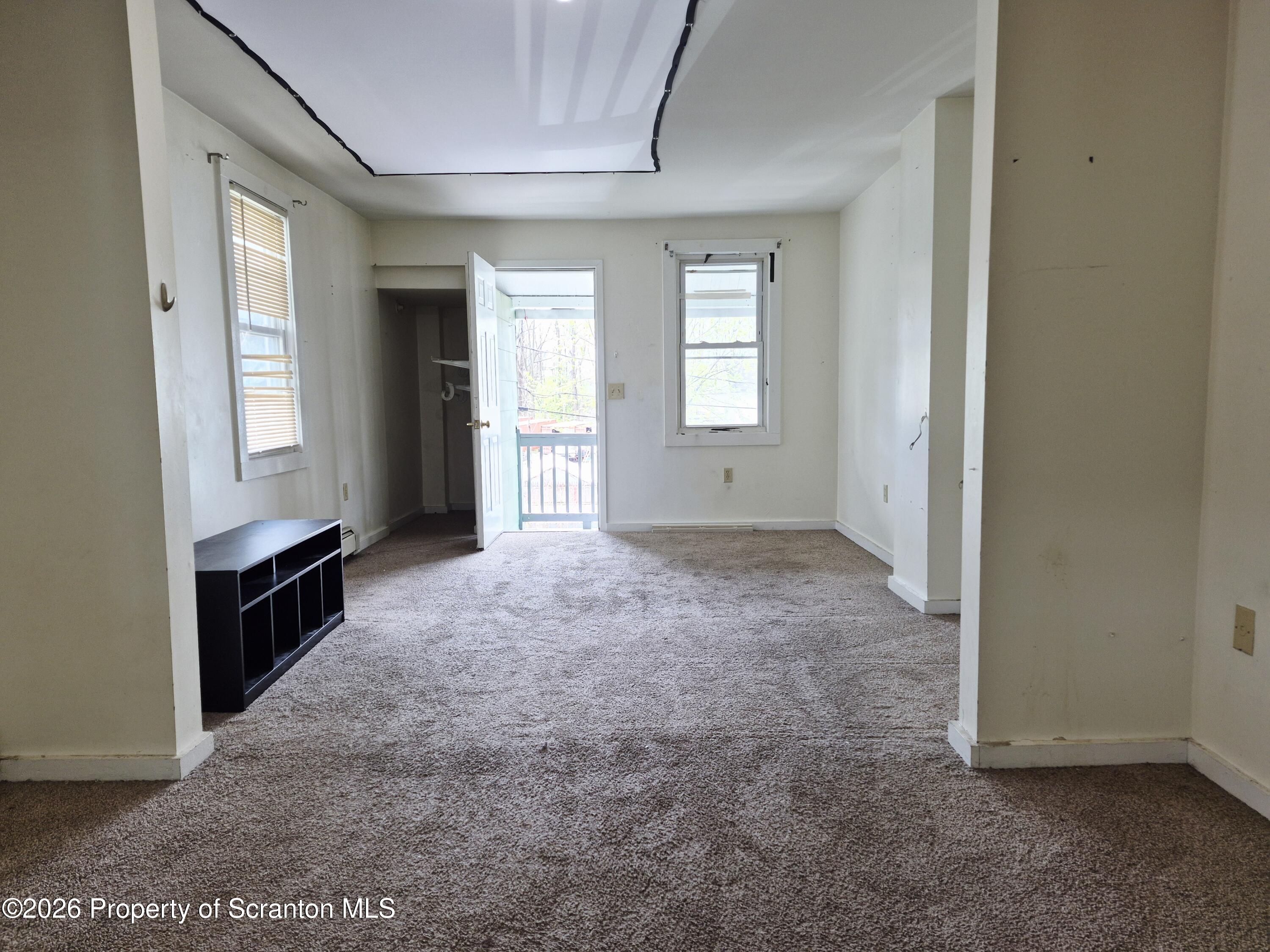 68 Green Place, Unit 1 Scranton, PA 18509 - Photo 12 of 15 an empty room with windows