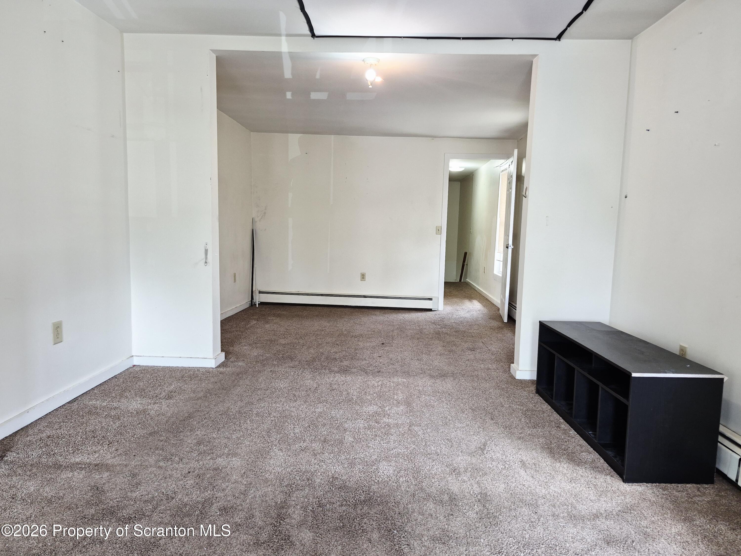 68 Green Place, Unit 1 Scranton, PA 18509 - Photo 13 of 15 a view of a big room with closet area