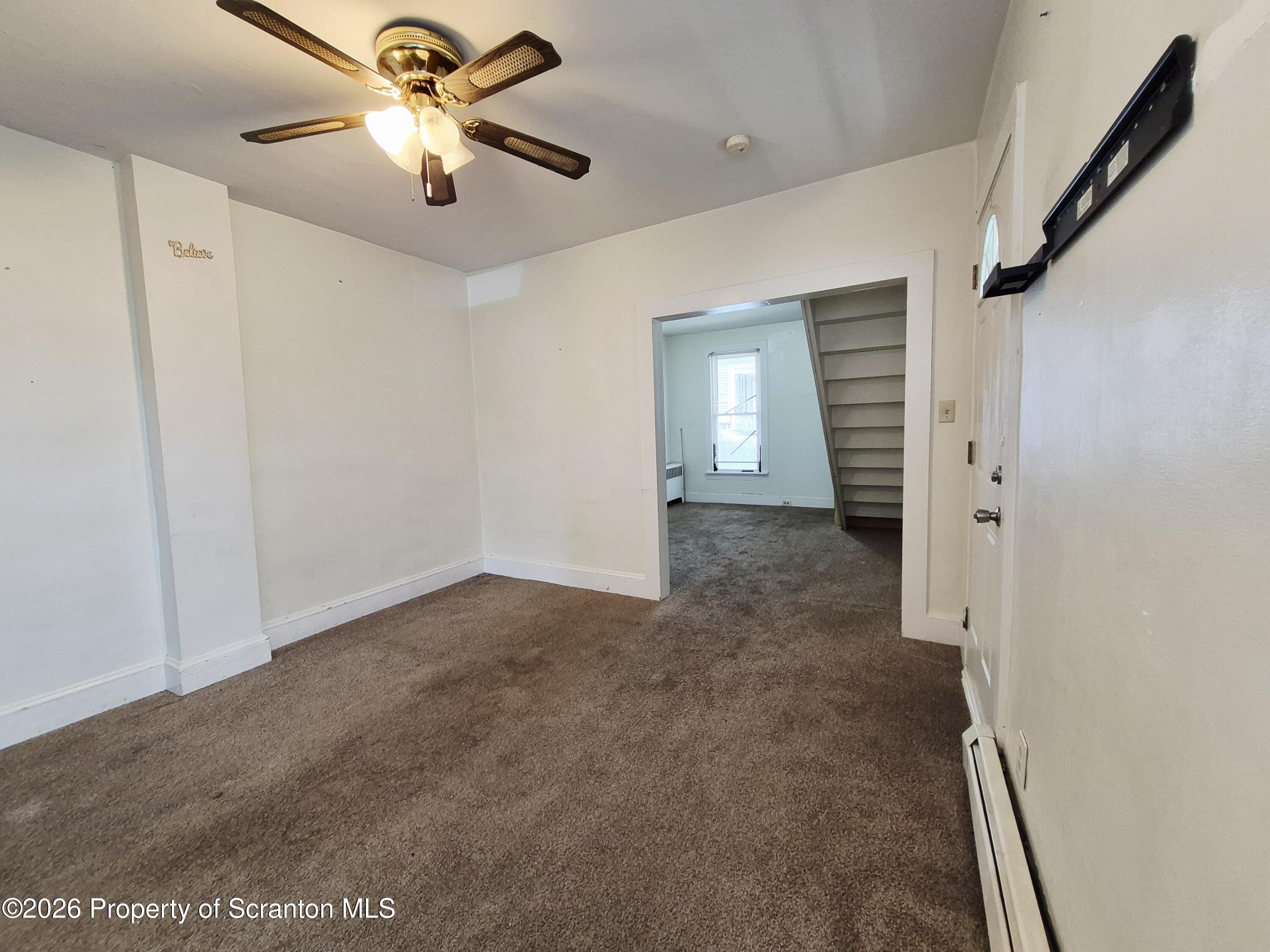 68 Green Place, Unit 1 Scranton, PA 18509 - Photo 7 of 15 wooden floor in an empty room