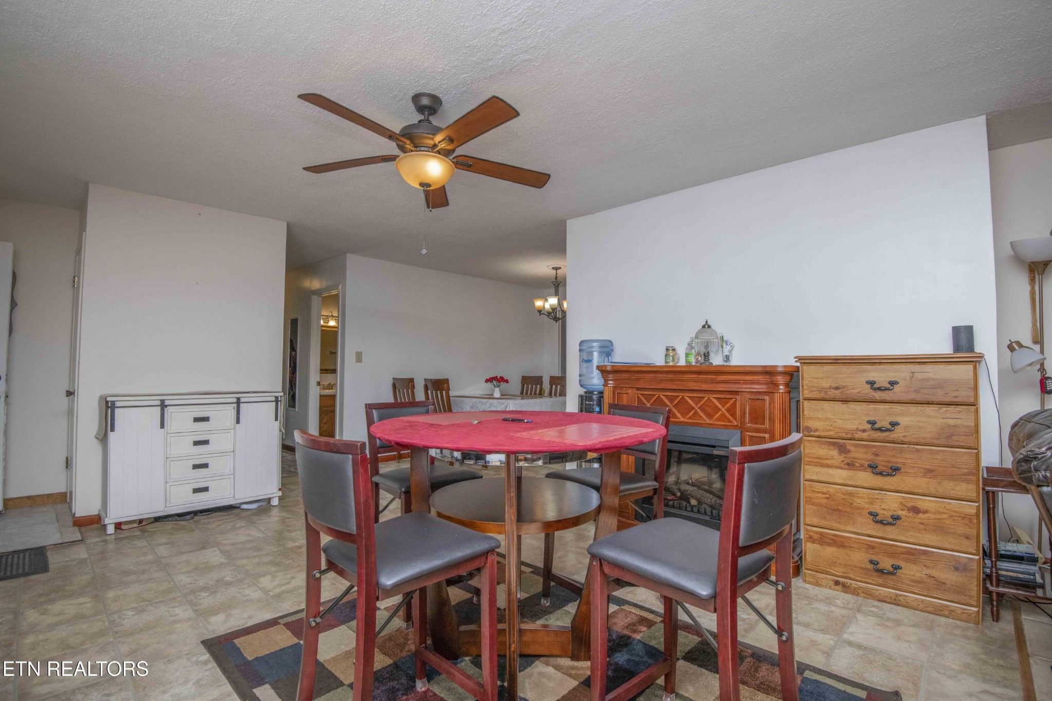 2206 Rambling Road Knoxville, TN 37912 - Photo 13 of 47 a dining room with a table and chairs