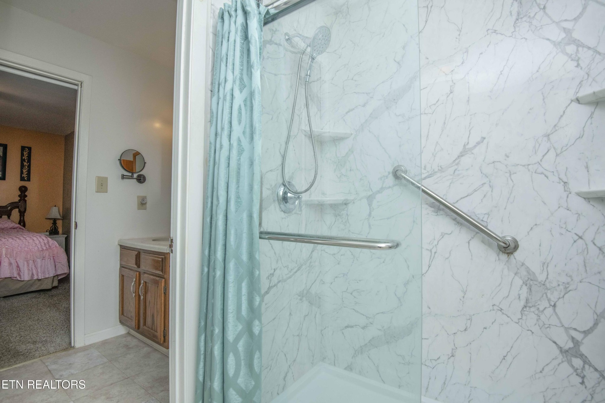 2206 Rambling Road Knoxville, TN 37912 - Photo 14 of 47 a bathroom with a granite countertop shower and a sink